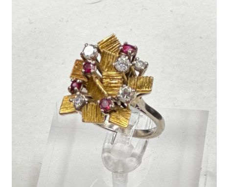 An 18ct gold set diamond and ruby ring, size N1/2