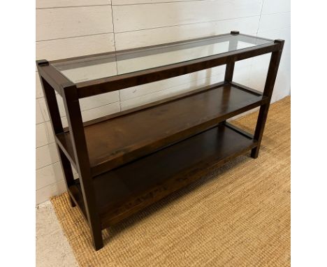 A contemporary console table with glass top (H80cm W123cm D36cm)