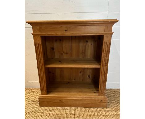 A pine two shelf bookcase with fluted sides (H78cm W66cm D30cm)