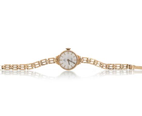 VERITY, NINE CARAT GOLD MANUAL WIND WRIST WATCH the round dial with baton hour markers, 19mm case, on a nine carat gold brace