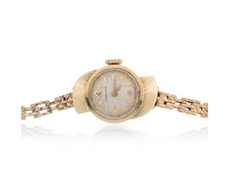 LONGINES, NINE CARAT GOLD MANUAL WIND WRIST WATCH the round dial with baton hour markers, 15mm case, on a nine carat gold bra