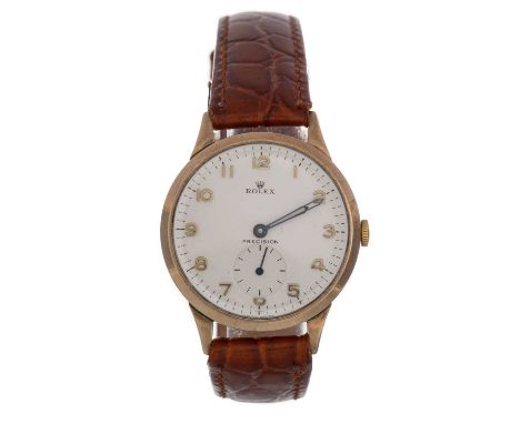 ROLEX PRECISION, NINE CARAT GOLD CASED MANUAL WIND WRIST WATCH  the round dial with Arabic hour markers, 32mm case, on a brow