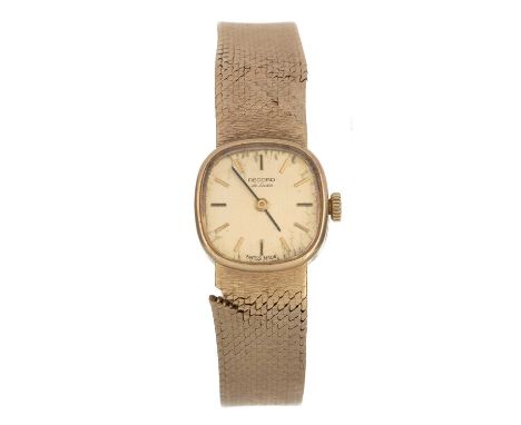 RECORD DE LUXE, NINE CARAT GOLD MANUAL WIND WRIST WATCH the round dial with baton hour markers, 17mm case, on a nine carat go