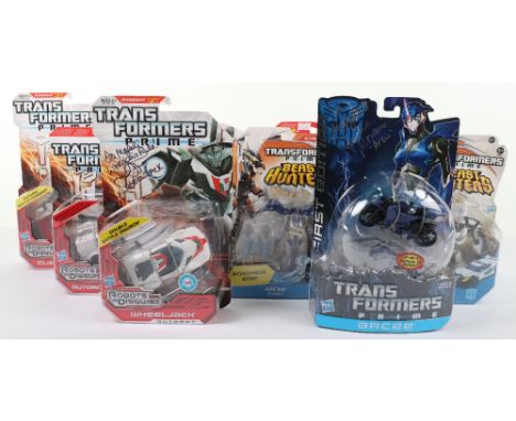 Transformers Prime carded and signed action figures, including, carded 2011 first edition toy r us exclusive arcee signed by 