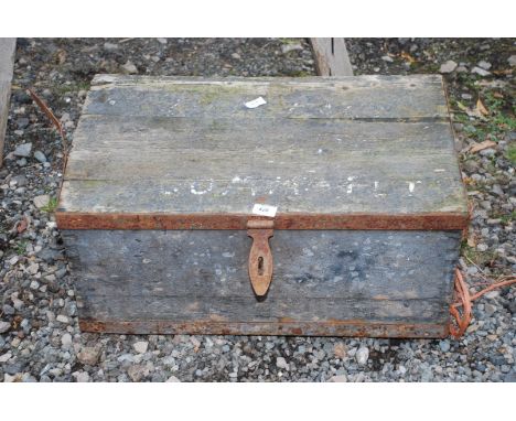 A metal bound wooden trunk.