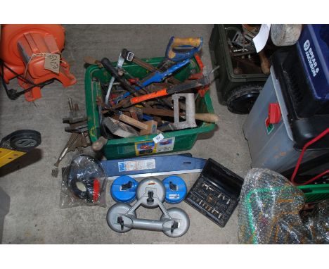 Plastic box of glass grippers, ear defenders, small bench vice, hammers, etc.