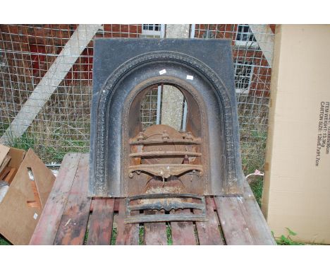 A cast iron fireplace.