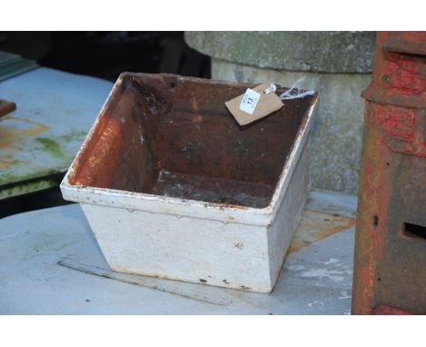 A cast iron rain hopper, 10'' x 12''