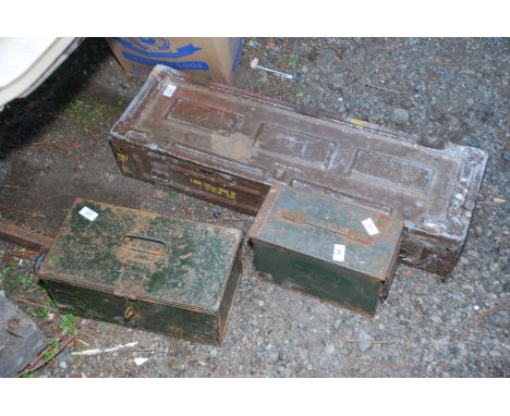 Three metal military trunks/ammunition boxes.