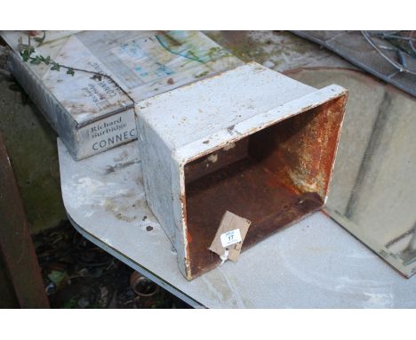 A rain hopper, 12'' x 10''.