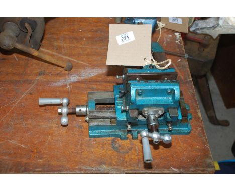 Dual action bench vice.