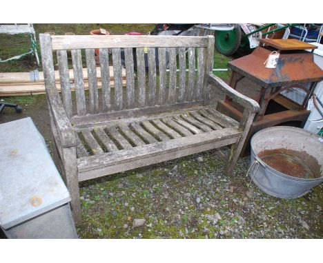 A garden bench, 48'' wide x 36'' high.