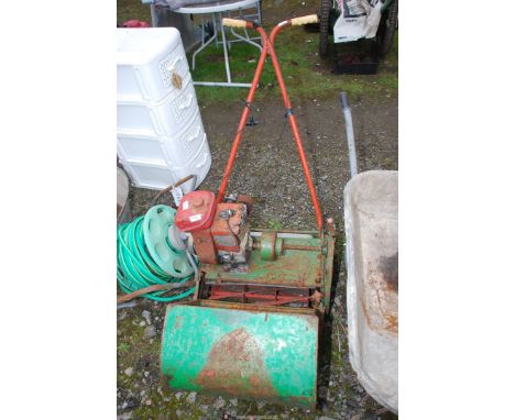 A cylinder mower (engine does not turn).