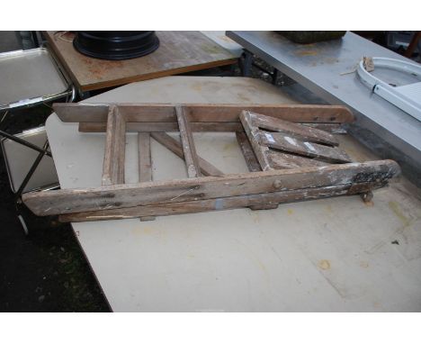 A three rung wooden step ladder.