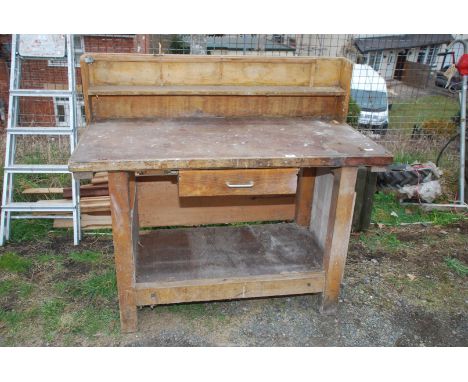A wooden Work Bench, 49'' wide x 26'' deep x 32'' high.