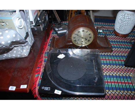 A Record deck and Westminster Napoleon style mantle clock.
