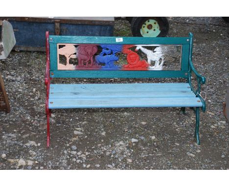 A child's cast iron backed bench with animal figures design, 32'' long x 21'' high.