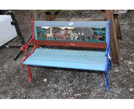 A child's cast iron back bench with animal figures design, 32'' long x 21'' high.