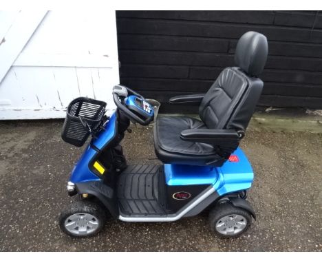 Pride Apex Epic mobility scooter in good working order with battery charger and rain cover plus manual