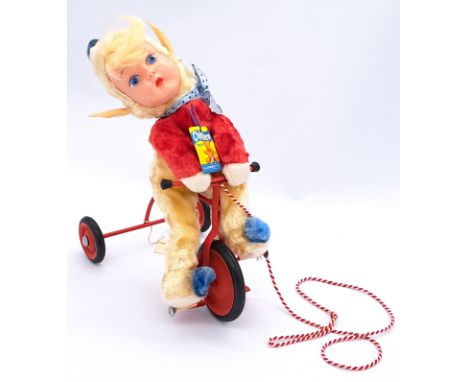 Chiltern Pixie on a Trike pull-along, with pedaling motion when string is pulled, late 1950s-early 1960s, artificial silk wit