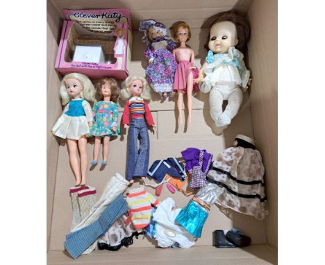 Pedigree Sindy and Patch dolls plus a small range of dolls clothing, clone dolls, plus others; would benefit from cleaning, F
