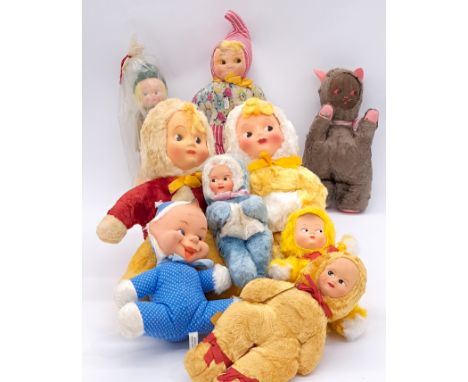 Assortment of vintage artificial silk/cloth dolls and toys, including plastic inset face dolls and cloth body dolls; some wou