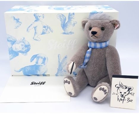 Steiff Wofi teddy bear, white tag 673429, alpaca, with notepad (detached; broken on back) and pen, inspired by Wolfgang Joop,