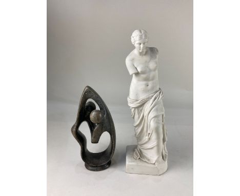 A R &amp; L parian figure of the Venus De Milo 34cm high, and a modernist carved stone figure group of a couple, (a/f) 