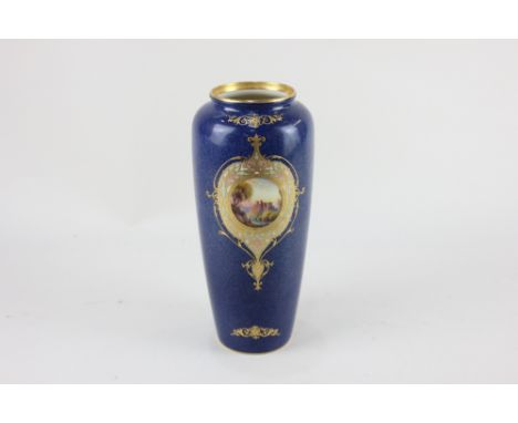 A Royal Worcester porcelain vase, of shouldered form, decorated with a circular vignette of a castle amongst a landscape, wit