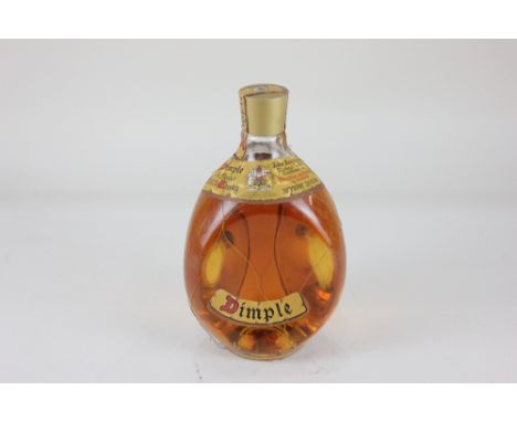 A bottle of Haig Dimple Scotch Whiskey 