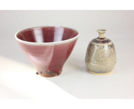 An Arabia Finland ceramic bowl, with sang de beouf style glaze, 18.5cm diameter, together with a Swedish glazed stoneware vas