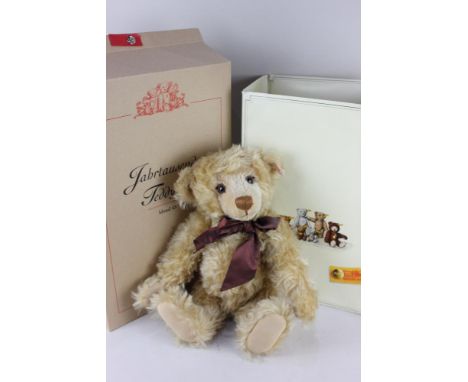 A Steiff Year 2000 tawny mohair teddy bear, with ear button, 43cm high, boxed