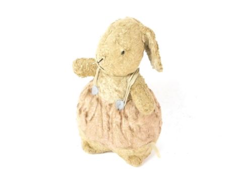 A Chiltern 1950s Ting-a-Ling Roly-Poly rabbit, with white and pink plush, bears label, 24cm H.