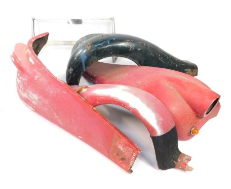 Three red painted wing wheel arches from a Spartan, together with a further Spartan wing, and a windscreen from a Spartan Roa