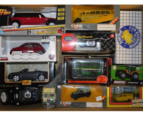 Corgi Maisto and other die cast Minis, buses and vintage trucks, most boxed. (qty)