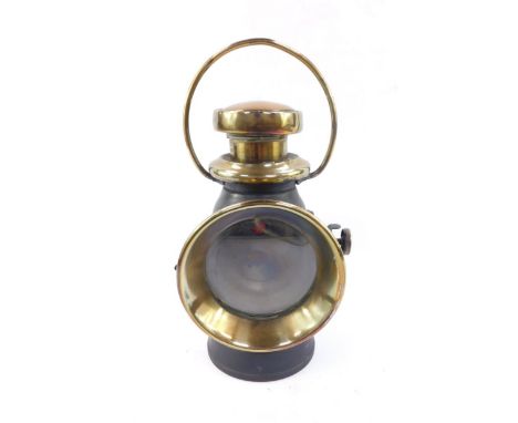 A brass and black painted Lucas 'King Of The Road' side lamp, No 726, with brass loop handle, 26.5cm H. We have instructions 