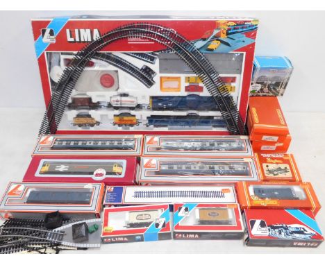 A Lima 00 gauge diesel train set, Royal Scots Grey, together with three Lima coaches, Dapol diesel locomotive West Yorkshire 