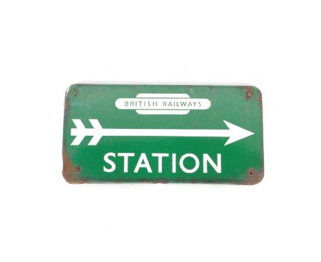 A British Railways Station green enamel sign, with white arrow and lettering, 27cm H, 53cm W.