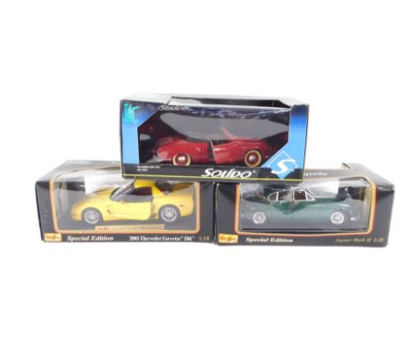 A Maisto die cast 2001 Chevrolet Corvette Z06 Special Edition, scale 1:18, Jaguar MkII Special Edition, and a Solido VW Carma