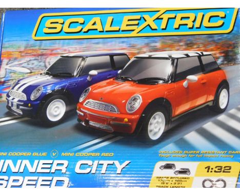 A Scalextric Inner City Speed Set, Mini Cooper blue and red, scale 1:32, boxed.