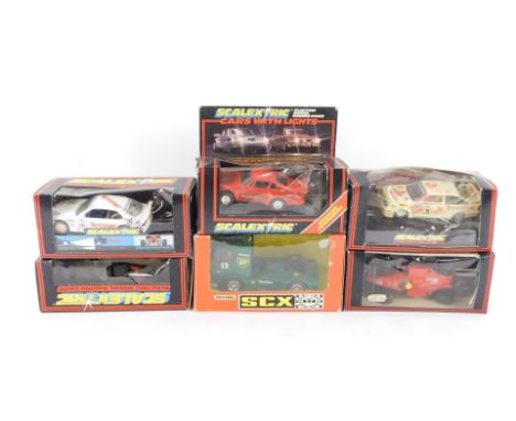 Five Scalextric model racing cars, comprising Cosworth Texaco C455., BMW 318i C571.,  Ferrari F1 C457., Porsche,  red with wo