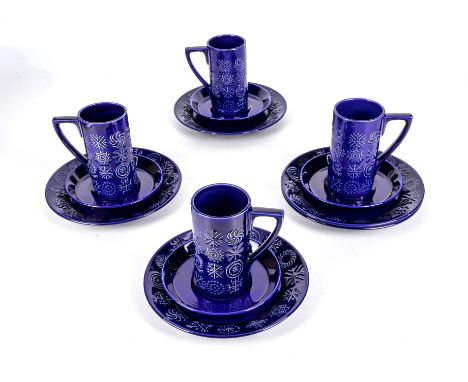 Four retro blue coffee mugs, saucers and side plates