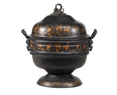 A Regency or George IV black japanned toleware coalbox, circa 1820, of oval section, the domed cover, body and spreading foot