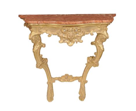 A giltwood and marble topped console table, 19th century, of serpentine outline, with pierced rococo carved frieze and scroll