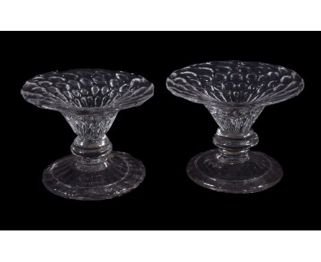 A pair of honeycomb moulded patch stands, mid 18th century,  with annular knop and folded conical foot, circa 7cm diameter   