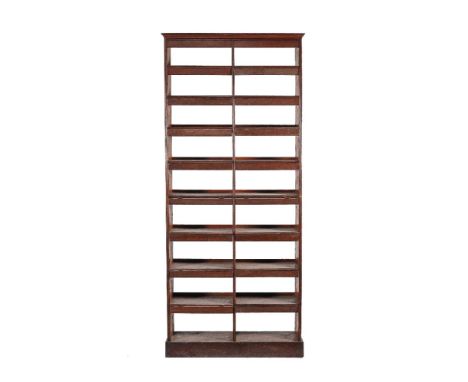 A mahogany and pine open bookcase, 19th century and later, each shelf incorporating a hinged dust flap, 242cm high, 108cm wid