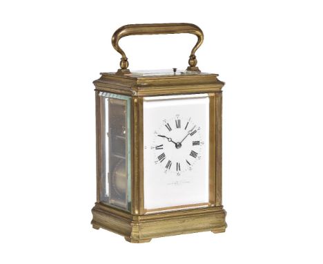 A gilt brass carriage clock, late 19th century, the eight-day gong striking movement with push button repeat and platform lev