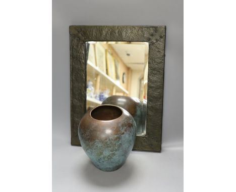 An Arts and Crafts planished copper mirror and a WMF Ikora vase