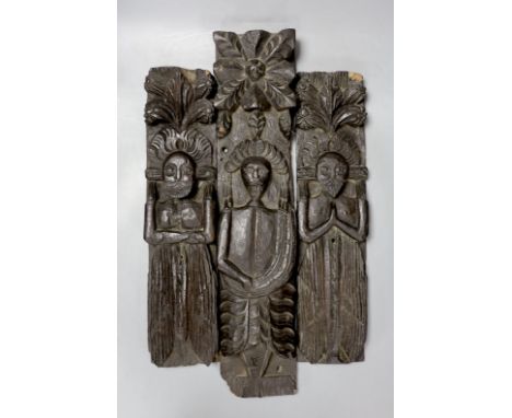 Three 17th century carved oak terminal figures - tallest 51.5cm