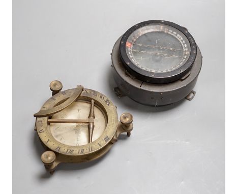 A 19th century Herbert &amp; Co. brass compass and another WWII compass